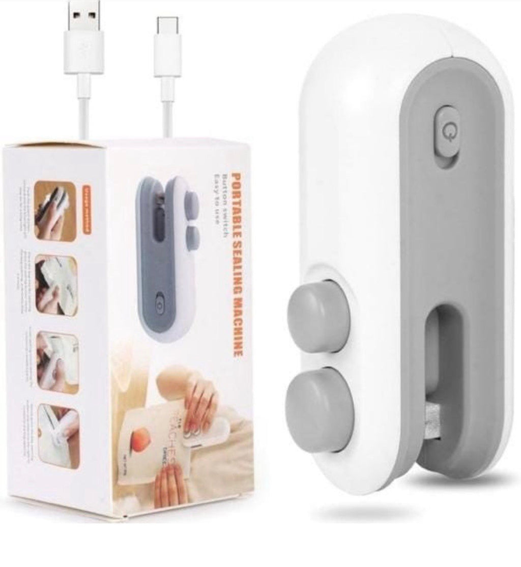 Portable sealing machine with USB cable and packaging on a white background